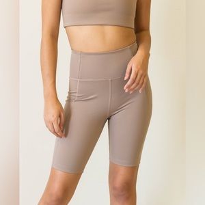 Girlfriend Collective Biker Shorts in Limestone